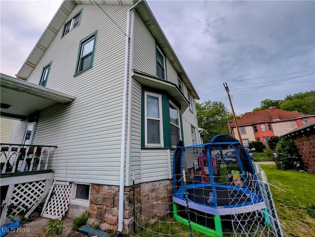 1510 Chester Ave, Wellsville, OH 43968 - view of home's exterior with a trampoline