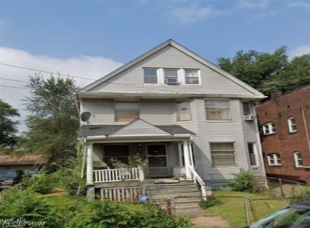 1422 W 84th St, Cleveland, OH 44102 - view of front of house with a fenced front yard and covered porch