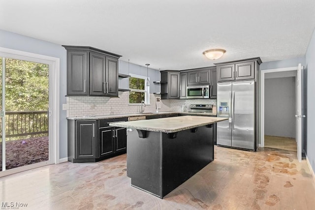 13109 Edison St NE, Alliance, OH 44601 - kitchen with a sink, open shelves, light countertops, tasteful backsplash, and appliances with stainless steel finishes