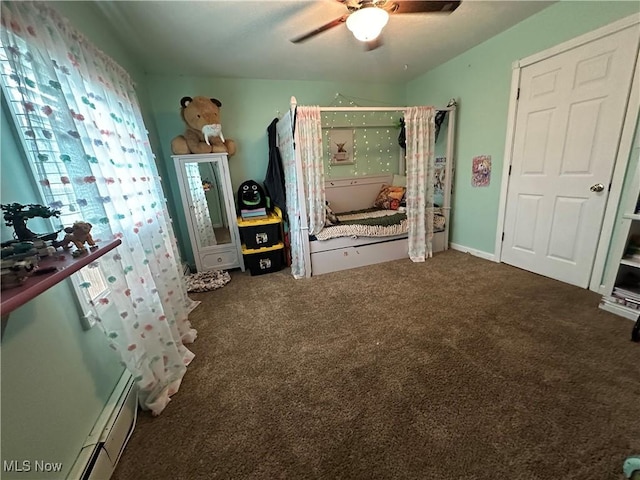 13978 Sprucevale Rd, East Liverpool, OH 43920 - carpeted bedroom featuring a baseboard radiator and ceiling fan