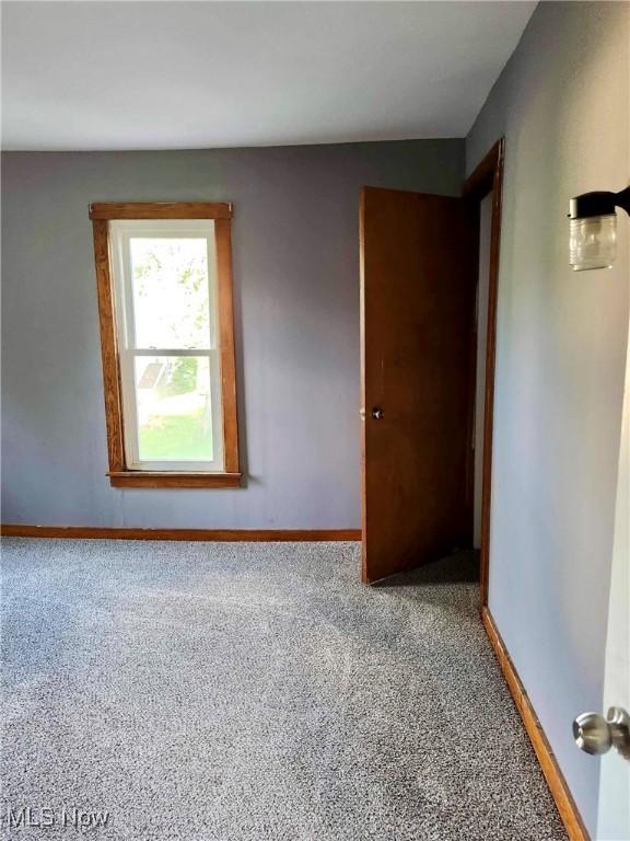 337 Foster Ave, Cambridge, OH 43725 - unfurnished room with carpet flooring and baseboards