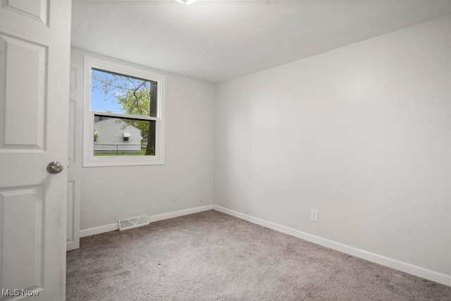 5331 Ridgewood St, Lorain, OH 44055 - carpeted spare room with baseboards and visible vents