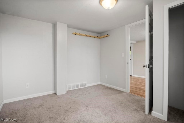 5331 Ridgewood St, Lorain, OH 44055 - unfurnished bedroom featuring baseboards, visible vents, and carpet