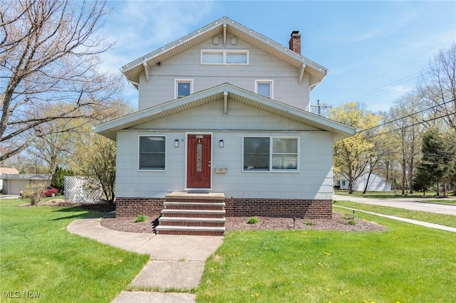 3019 Clague Rd, North Olmsted, OH 44070 - traditional style home featuring a chimney and a front yard
