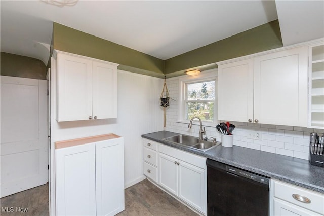 3019 Clague Rd, North Olmsted, OH 44070 - kitchen with a sink, tasteful backsplash, black dishwasher, open shelves, and white cabinetry