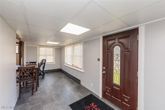 3019 Clague Rd, North Olmsted, OH 44070 - foyer featuring a baseboard heating unit and a paneled ceiling