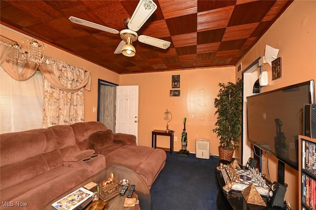 carpeted living room featuring a ceiling fan and wood ceiling
