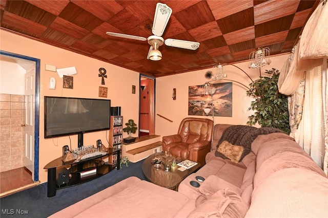living area featuring ceiling fan and wood ceiling