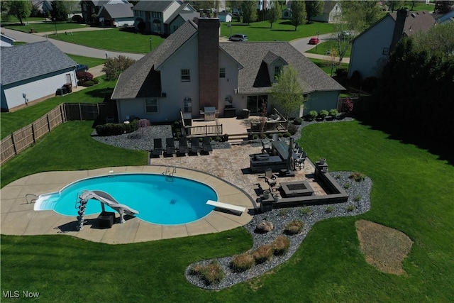7966 Meadowbrooke Trl, Poland, OH 44514 - view of swimming pool with a yard, a fenced in pool, a patio area, a water slide, and a fenced backyard