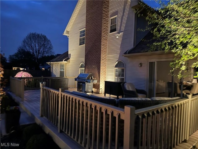 7966 Meadowbrooke Trl, Poland, OH 44514 - back of property with a chimney, a deck, and outdoor lounge area