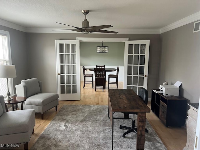 7966 Meadowbrooke Trl, Poland, OH 44514 - office area with a ceiling fan, ornamental molding, light wood finished floors, and visible vents