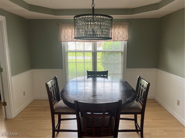 7966 Meadowbrooke Trl, Poland, OH 44514 - dining room featuring light wood-style flooring and a wainscoted wall