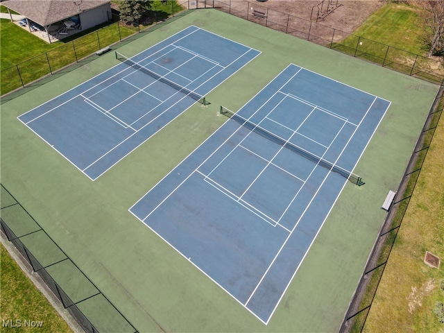 10836 Watercress Rd, Strongsville, OH 44149 - view of tennis court featuring a yard and fence