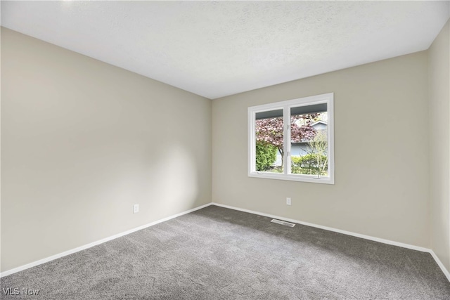 10836 Watercress Rd, Strongsville, OH 44149 - spare room featuring visible vents, baseboards, and carpet floors