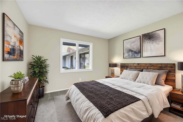 10836 Watercress Rd, Strongsville, OH 44149 - bedroom with dark colored carpet and baseboards
