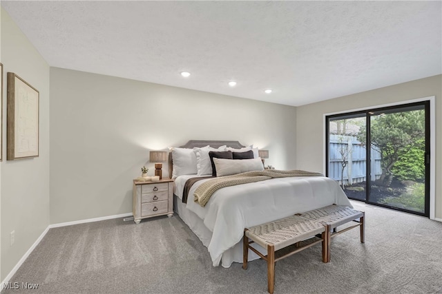 10836 Watercress Rd, Strongsville, OH 44149 - bedroom featuring carpet, a textured ceiling, baseboards, and access to exterior