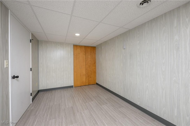 1181 S Broadway, New Philadelphia, OH 44663 - spare room with a drop ceiling, baseboards, visible vents, and wood finished floors