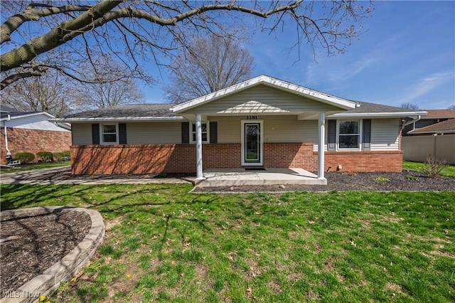 1181 S Broadway, New Philadelphia, OH 44663 - view of front of property with a front lawn and brick siding