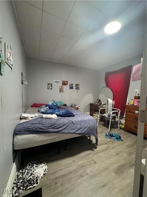 722 John St, Coshocton, OH 43812 - bedroom with wood finished floors