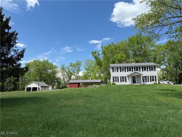 2320 Leetonia Rd, Leetonia, OH 44431 - view of grassy yard with a garage