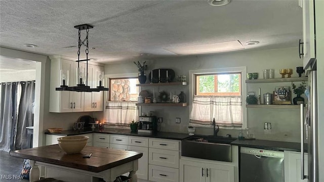 2320 Leetonia Rd, Leetonia, OH 44431 - kitchen featuring dishwasher, open shelves, a sink, dark countertops, and a textured ceiling