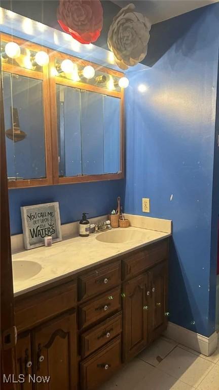 2320 Leetonia Rd, Leetonia, OH 44431 - full bath with double vanity and tile patterned flooring