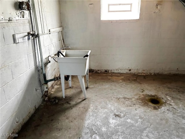 basement with concrete block wall