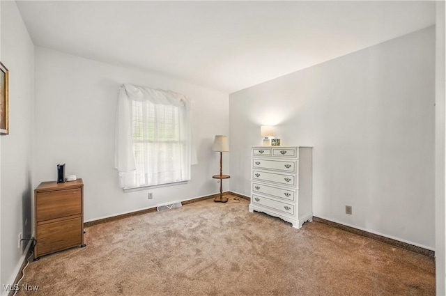 bedroom with carpet flooring, visible vents, and baseboards