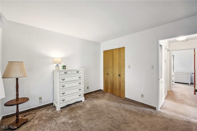 carpeted bedroom with a closet