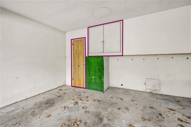 interior space featuring concrete floors