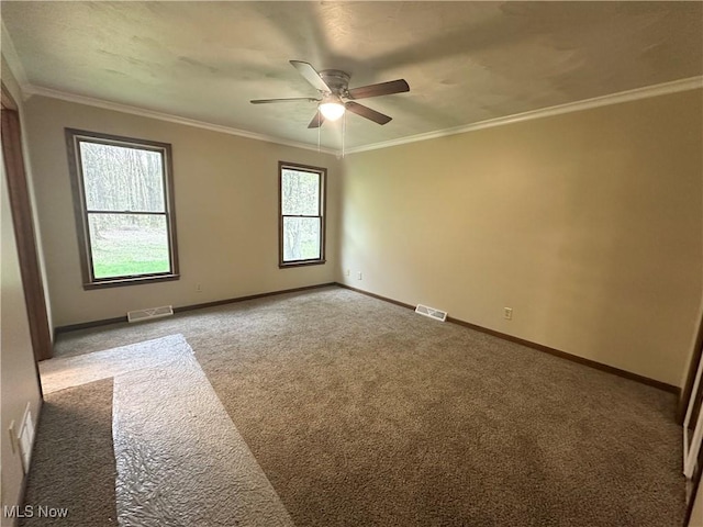 5869 Amy Boyle Rd NE, Brookfield, OH 44403 - empty room with a ceiling fan, baseboards, visible vents, and carpet