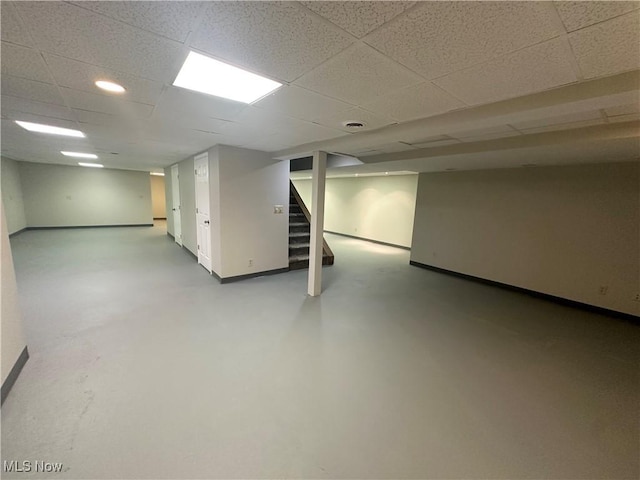 5869 Amy Boyle Rd NE, Brookfield, OH 44403 - finished basement featuring stairway and a paneled ceiling