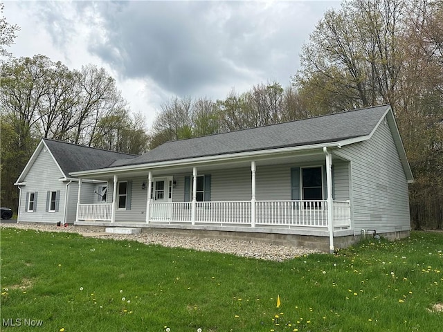 5869 Amy Boyle Rd NE, Brookfield, OH 44403 - view of front facade with covered porch and a front lawn