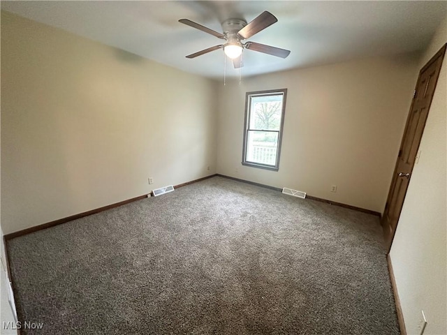 5869 Amy Boyle Rd NE, Brookfield, OH 44403 - carpeted spare room with ceiling fan, baseboards, and visible vents