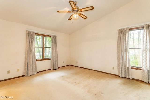 9122 Katherine Ct, Mentor, OH 44060 - spare room with light colored carpet, vaulted ceiling, baseboards, and a ceiling fan