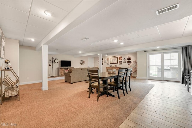 dining area with baseboards, recessed lighting, light wood finished floors, and visible vents