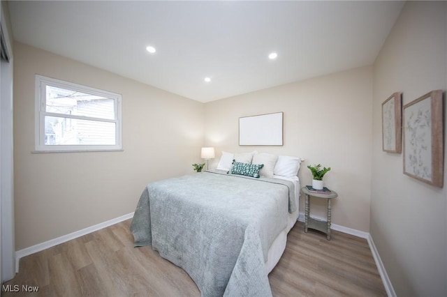 6544 Nancy Dr, North Olmsted, OH 44070 - bedroom featuring baseboards, recessed lighting, and light wood-type flooring