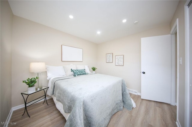 6544 Nancy Dr, North Olmsted, OH 44070 - bedroom with recessed lighting, baseboards, and wood finished floors