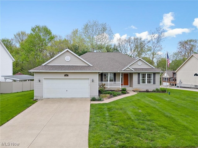 ranch-style house featuring a porch, concrete driveway, a garage, and a front yard
