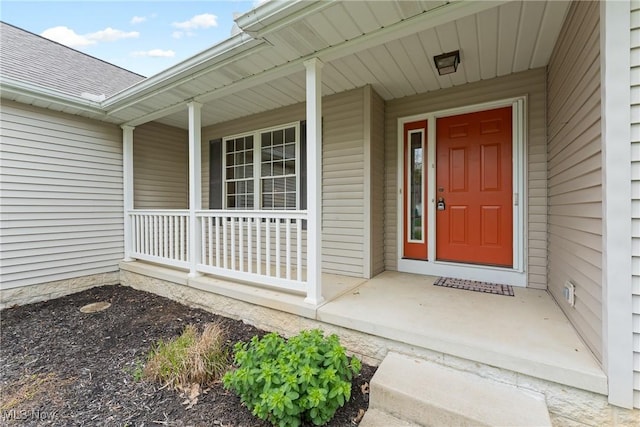 property entrance with covered porch