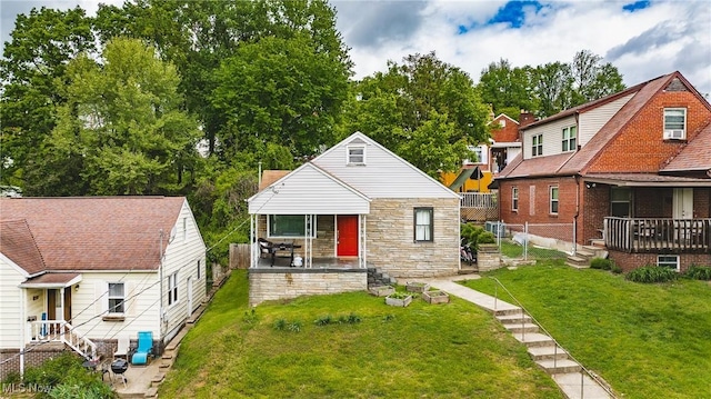 2007 Carson St, Charleston, WV 25302 - bungalow-style house featuring stone siding, a porch, and a front lawn