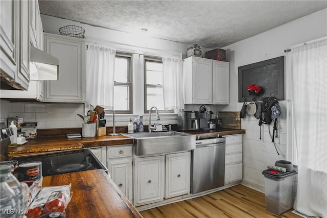 2007 Carson St, Charleston, WV 25302 - kitchen with a textured ceiling, dishwasher, a sink, wood counters, and ventilation hood