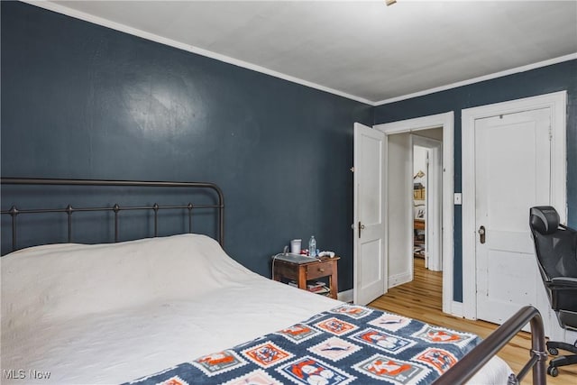 2007 Carson St, Charleston, WV 25302 - bedroom with ornamental molding, baseboards, and wood finished floors