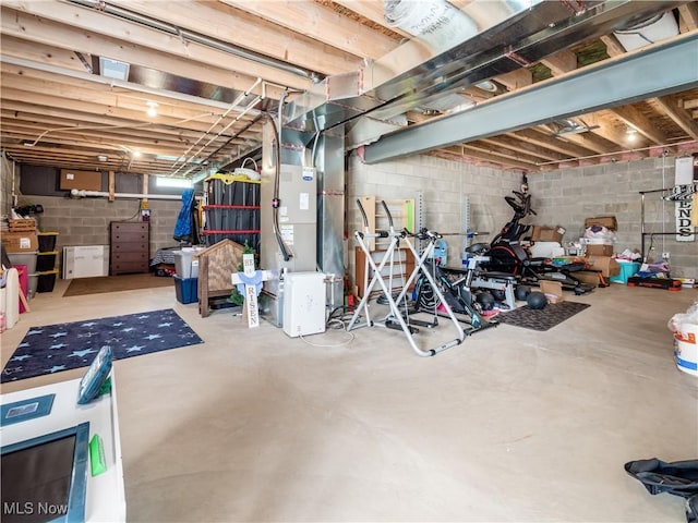 11149 Rankin Rd, Glenford, OH 43739 - unfinished below grade area featuring concrete block wall and heating unit