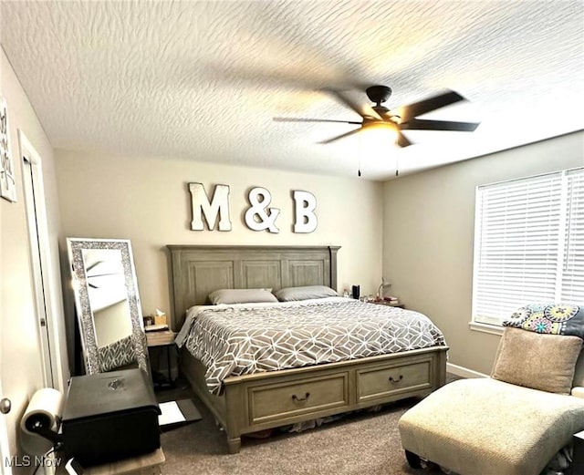 11149 Rankin Rd, Glenford, OH 43739 - bedroom with carpet, a ceiling fan, and a textured ceiling