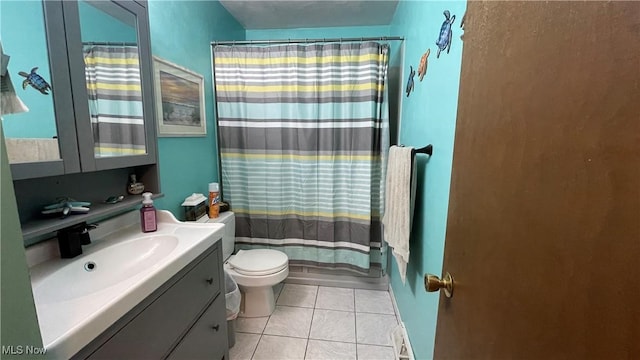 full bath with toilet, shower / tub combo with curtain, tile patterned flooring, and vanity
