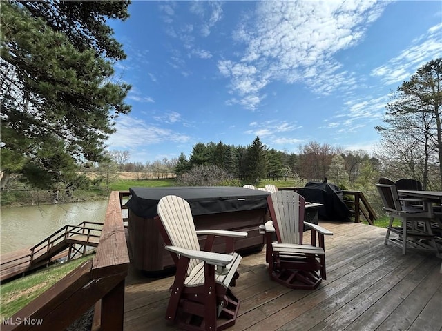 165 Township Rd Unit 1461, Greenwich, OH 44805 - wooden deck with a hot tub and a water view