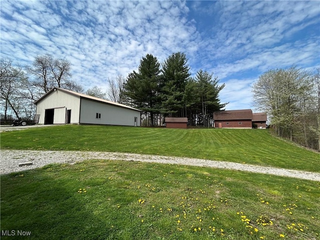 165 Township Rd Unit 1461, Greenwich, OH 44805 - view of yard featuring an outbuilding, a pole building, and a detached garage