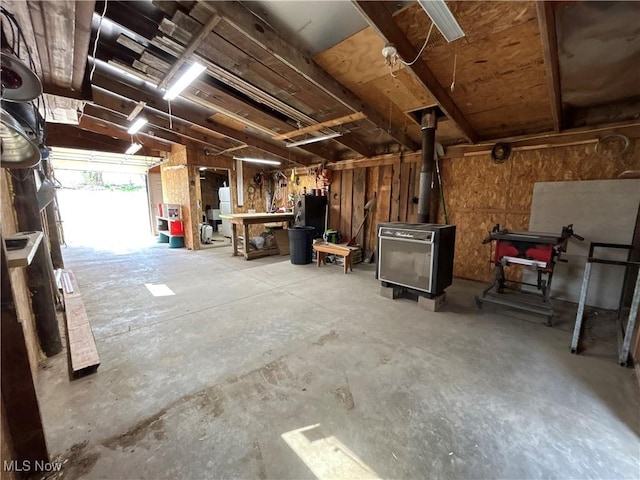 165 Township Rd Unit 1461, Greenwich, OH 44805 - interior space featuring a wood stove and a workshop area