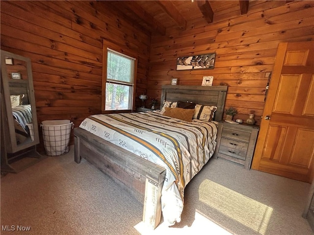 165 Township Rd Unit 1461, Greenwich, OH 44805 - carpeted bedroom featuring beamed ceiling, wood walls, and wooden ceiling